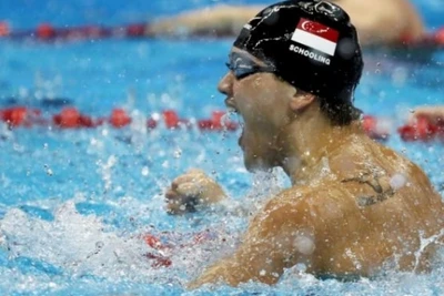 Joseph Schooling ăn mừng chiến thắng. (Ảnh: Reuters)