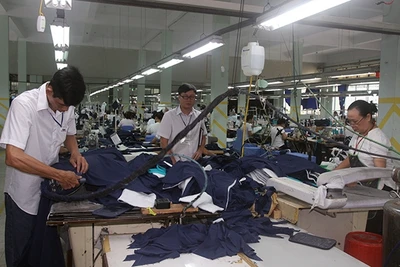 Sản xuất hàng dệt may xuất khẩu tại Tổng công ty May Ðồng Nai.