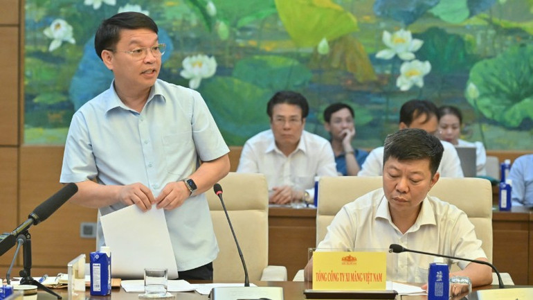 Chủ tịch Hội đồng thành viên Tổng công ty Xi măng Việt Nam Nguyễn Quốc Việt phát biểu tại cuộc làm việc. z6810846537823-f43def13046e65d5f2d6646b843f86cd-561.jpg