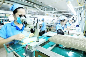 Công ty TNHH Rhythm Việt Nam (Hà Nội), doanh nghiệp Nhật Bản chuyên sản xuất linh kiện chính xác, khuôn đúc, bảng mạch điện tử. Ảnh: THÀNH ĐẠT