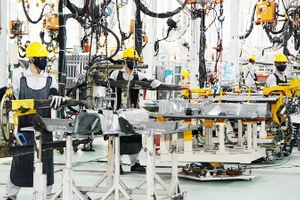 Để đạt được mục tiêu tăng trưởng, các doanh nghiệp phải nỗ lực đổi mới sáng tạo và áp dụng khoa học - công nghệ. Ảnh: BẮC SƠN