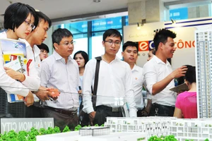 Lãi suất cho vay đầu tư kinh doanh bất động sản sẽ tiếp tục duy trì ở mức cao hơn mặt bằng chung. Ảnh: NGUYỆT ANH