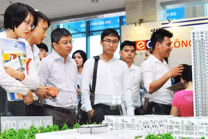 Lãi suất cho vay đầu tư kinh doanh bất động sản sẽ tiếp tục duy trì ở mức cao hơn mặt bằng chung. Ảnh: NGUYỆT ANH