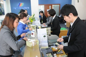 Tín dụng bất động sản có thể tạo lực đẩy cho thị trường trong ngắn hạn. Ảnh: NAM ANH