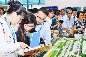 Trong lĩnh vực bất động sản, nhiều doanh nghiệp báo lỗ do chi phí vốn lớn. Ảnh: NGUYỆT ANH