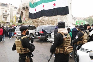 Lực lượng an ninh Syria bảo vệ một sự kiện tại Thủ đô Damas. Ảnh: CNN