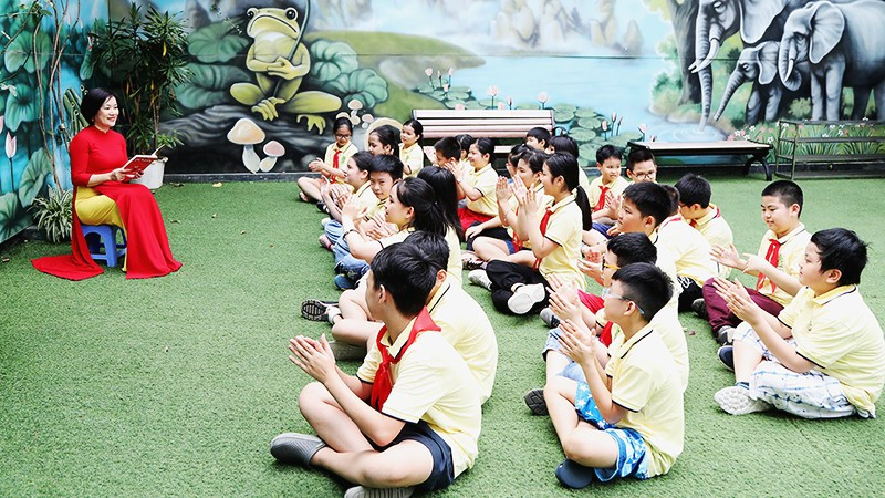 Giáo viên cần là hình mẫu trong việc lan tỏa nét đẹp mặc trong nhà trường. Ảnh: KHIẾU MINH 132.jpg