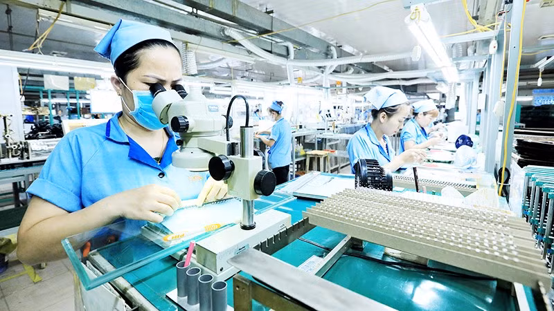 Công ty TNHH Rhythm Việt Nam (Hà Nội), doanh nghiệp Nhật Bản chuyên sản xuất linh kiện chính xác, khuôn đúc, bảng mạch điện tử. Ảnh: THÀNH ĐẠT