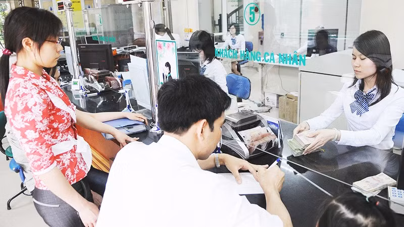 Hiện nay, tiền gửi huy động phần lớn là ngắn hạn. Ảnh: NAM ANH