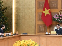 Thủ tướng Chính phủ Phạm Minh Chính và Đại sứ Trung Quốc tại Việt Nam Hà Vĩ cùng các đại biểu Trung Quốc. (Ảnh: Trần Hải)