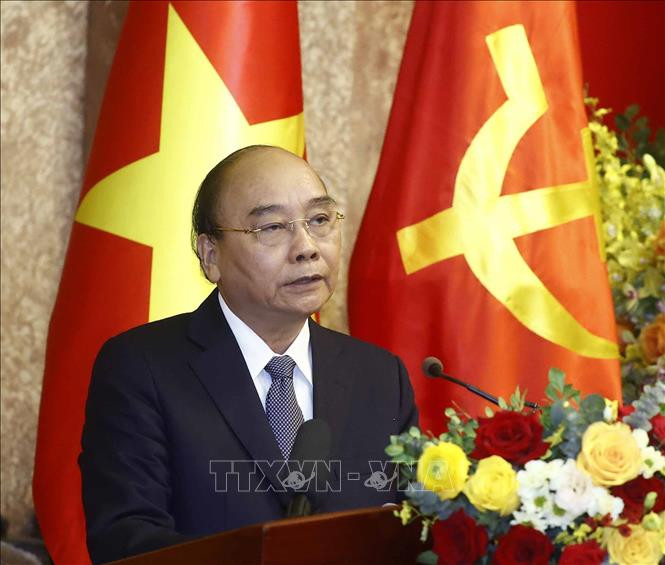 Nguyên Chủ tịch nước Nguyễn Xuân Phúc phát biểu. (Ảnh: THỐNG NHẤT/TTXVN)