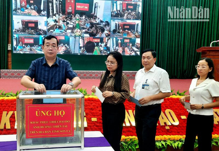 Cán bộ, đảng viên huyện Yên Châu tham gia hưởng ứng lời kêu gọi của Ủy ban Mặt trận Tổ quốc Việt Nam tỉnh Sơn La.