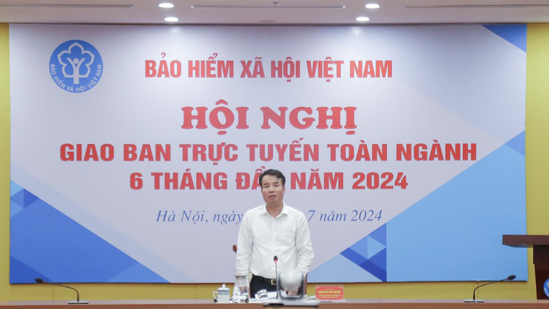 Tổng Giám đốc Bảo hiểm xã hội Việt Nam Nguyễn Thế Mạnh chủ trì hội nghị. (Ảnh: VSS)