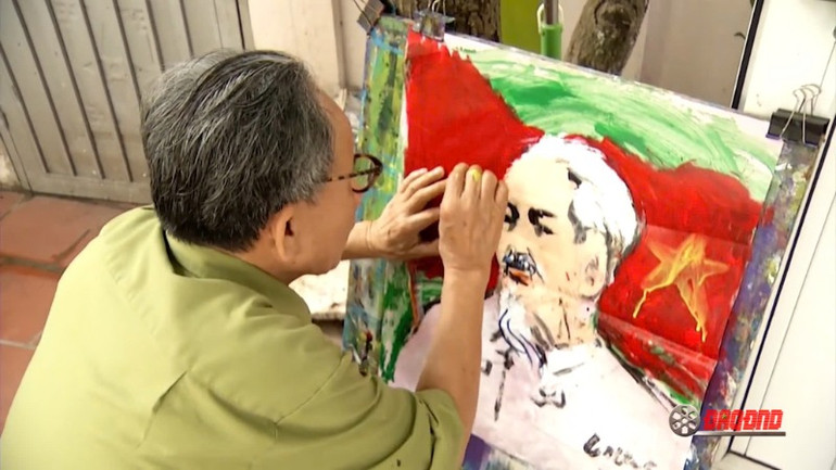 Họa sĩ, Anh hùng Lực lượng vũ trang Lê Duy Ứng khắc họa chân dung Bác Hồ.