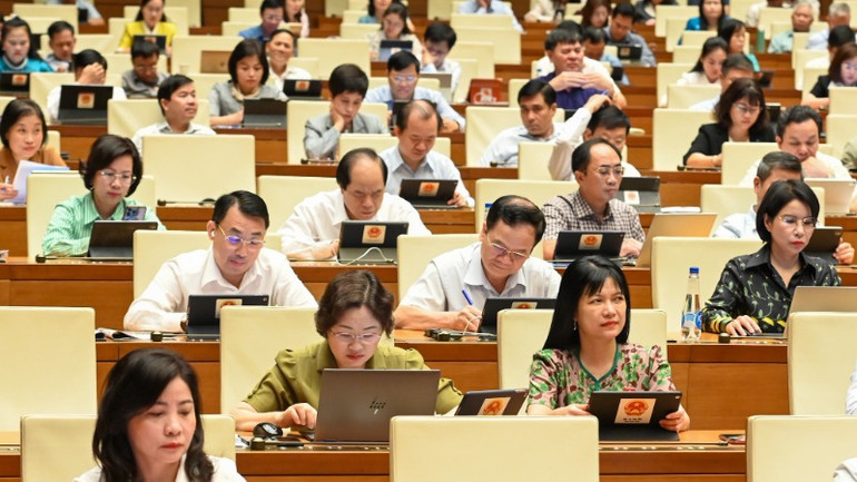 Quốc hội làm việc ở hội trường nghe Báo cáo giải trình, tiếp thu, chỉnh lý dự thảo Luật sửa đổi, bổ sung một số điều của Luật Quảng cáo. (Ảnh: BÙI GIANG) Quốc hội làm việc ở hội trường nghe Báo cáo giải trình, tiếp thu, chỉnh lý dự thảo Luật sửa đổi, bổ sung một số điều của Luật Quảng cáo. (Ảnh: BÙI GIANG)