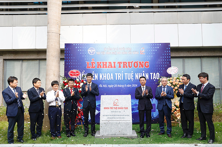 Các đại biểu khai trương gắn biển tên Khoa Trí tuệ nhân tạo. Các đại biểu khai trương gắn biển tên Khoa Trí tuệ nhân tạo.