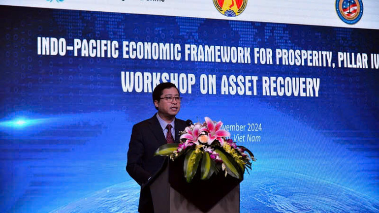 Phó Tổng Thanh tra Chính phủ Dương Quốc Huy phát biểu tại hội thảo.