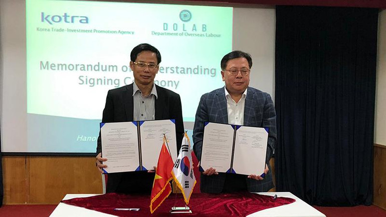 Ký thỏa thuận hợp tác giữa Cục Quản lý lao động ngoài nước - Cơ quan Xúc tiến thương mại và đầu tư Hàn Quốc năm 2019 (Ảnh: Dolab).