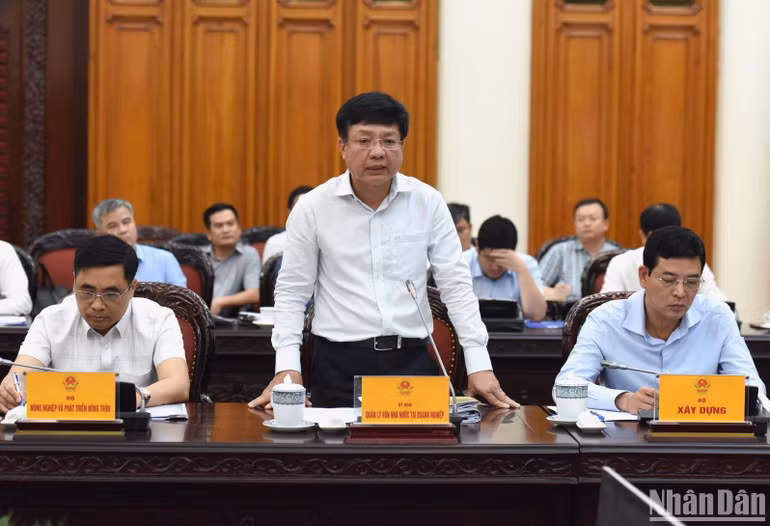 Đại diện lãnh đạo Ủy ban Quản lý vốn nhà nước tại doanh nghiệp phát biểu. (Ảnh: TRẦN HẢI) Đại diện lãnh đạo Ủy ban Quản lý vốn nhà nước tại doanh nghiệp phát biểu. (Ảnh: TRẦN HẢI)