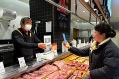 Tại Trung Quốc, từ miếng thịt, bó rau hay củ hành đều có mã vạch, tạo thuận lợi cho các hộ kinh doanh hoàn thiện hồ sơ thuế. (Nguồn THX)