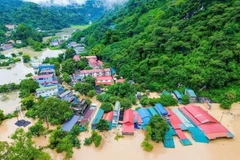 Xã Bảo Lâm (tỉnh Cao Bằng) ngập sâu trong nước, ảnh chụp ngày 30/9. (Ảnh TTXVN)