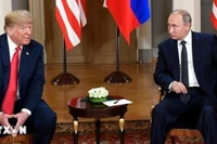 Tổng thống Mỹ Donald Trump và Tổng thống Nga Vladimir Putin (Ảnh: THX/TTXVN)