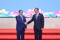 Thủ tướng Chính phủ Phạm Minh Chính và Thủ tướng Chính phủ Lào Sonexay Siphandone. (Ảnh: VGP/Nhật Bắc)