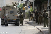 Các lực lượng Israel được triển khai tại thành phố Nablus, Bờ Tây. (Ảnh: THX/TTXVN)