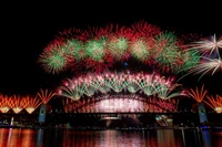 Pháo hoa rực rỡ chào đón năm mới 2026 tại Cầu Cảng Sydney, Australia. (Ảnh: THX/TTXVN)