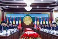 Tổng Bí thư Tô Lâm hội đàm với Tổng Bí thư, Chủ tịch nước Lào Thongloun Sisoulith. (Ảnh: Thống Nhất/TTXVN)