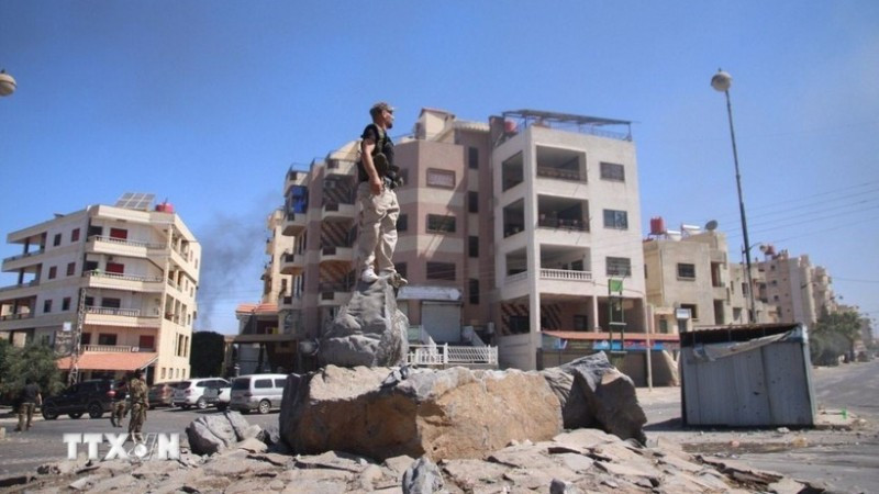 Các lực lượng an ninh Syria tại thành phố Sweida ngày 15/7/2025. (Ảnh: THX/TTXVN)