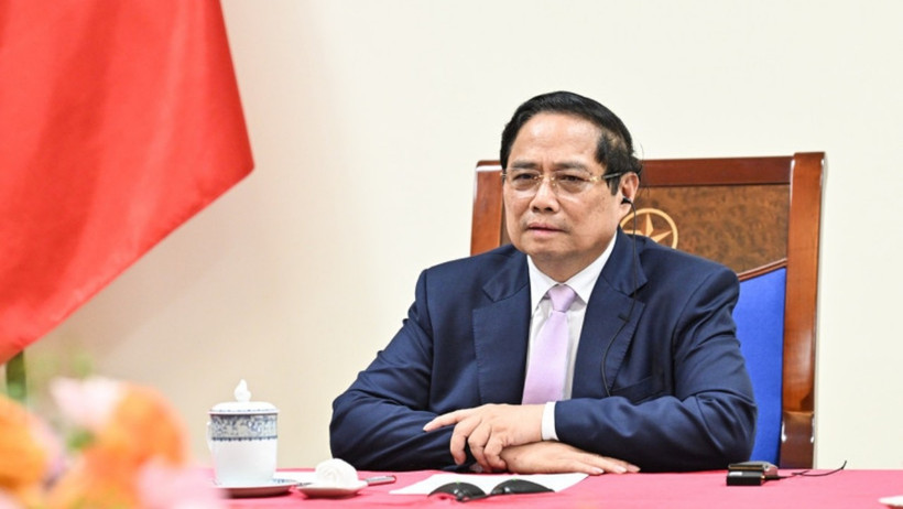 Thủ tướng Chính phủ Phạm Minh Chính điện đàm với Thủ tướng Malaysia Anwar Ibrahim. (Ảnh: Trần Hải)