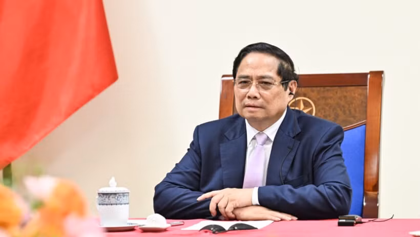 Thủ tướng Chính phủ Phạm Minh Chính điện đàm với Thủ tướng Malaysia Anwar Ibrahim. (Ảnh: Trần Hải)