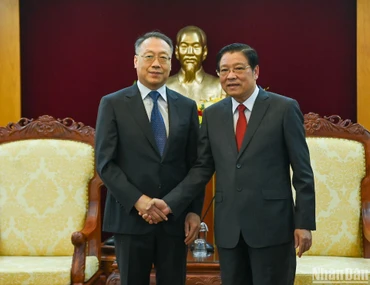 Trưởng Ban Nội chính Trung ương Phan Đình Trạc và Phó Tổng Thư ký Ủy ban Chính pháp Trung ương Đảng Cộng sản Trung Quốc Dương Xuân Lôi tại buổi tiếp.