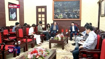 Báo Nhân Dân tiếp Đại diện Văn phòng Tân Hoa xã tại Hà Nội