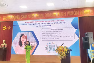Cô giáo Giang Thị Thanh Nhàn trình bày sáng kiến ứng dụng công nghệ 4.0 vào giảng dạy cho trẻ mầm non.