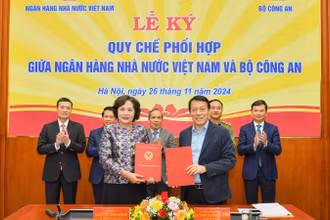 Lễ ký quy chế phối hợp giữa Ngân hàng Nhà nước Việt Nam và Bộ Công an.