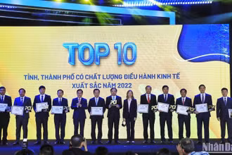 Công bố Báo cáo thường niên "Chỉ số Năng lực cạnh tranh cấp tỉnh" (PCI) 2022. Ảnh: Minh Dũng