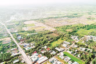 Thuế chuyển mục đích sử dụng đất sẽ tăng cao nhiều lần nếu áp dụng bảng giá đất điều chỉnh. (Ảnh chụp tại huyện Củ Chi) 