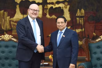 Thủ tướng Phạm Minh Chính và ông Tomas Heidar, Chánh án Tòa án quốc tế về Luật biển (ITLOS). (Ảnh: TRẦN HẢI)
