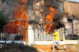 Cháy rừng thiêu rụi nhiều ngôi nhà ở miền trung Chile. (Ảnh: REUTERS)
