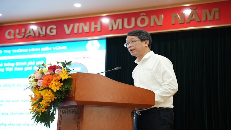 Cục trưởng Phát triển đô thị (Bộ Xây dựng) Trần Quốc Thái phát biểu tại hội nghị. (Ảnh: LAN HƯƠNG) anh-cuc-truong-thai.jpg