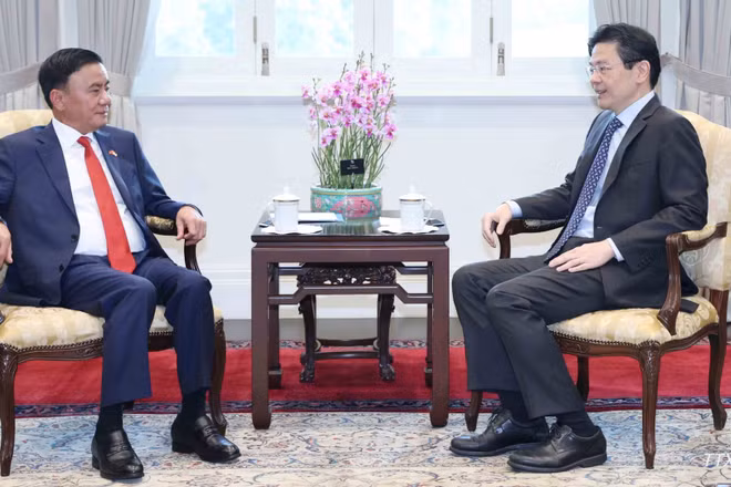 Thường trực Ban Bí thư Trần Cẩm Tú hội kiến Tổng Thư ký Đảng Hành động Nhân dân, Thủ tướng Singapore Lawrence Wong. (Ảnh: TTXVN)