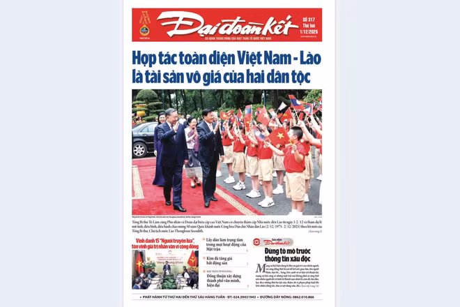 Trang bìa Báo Đại đoàn kết số ra ngày 1/12/2025 có mặt trên chuyên cơ của Hãng hàng không quốc gia Vietnam Airlines phục vụ chuyến công tác của Tổng Bí thư Tô Lâm và Phu nhân tại chuyến thăm cấp Nhà nước tới Lào theo lời mời của Tổng Bí thư, Chủ tịch nước Thongloun Sisoulith và Phu nhân, từ ngày 1 đến 2/12/2025.