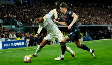 Thế trận đôi công hấp dẫn được Real Madrid và Manchester City tạo ra. (Ảnh: The Week)
