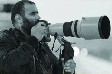 Phóng viên ảnh Khalid Al-Misslam. (Ảnh: Gulf Times)