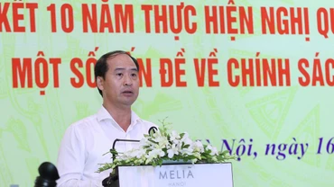 Thứ trưởng Lao động–Thương binh và Xã hội Nguyễn Văn Hồi phát biểu tại hội thảo.