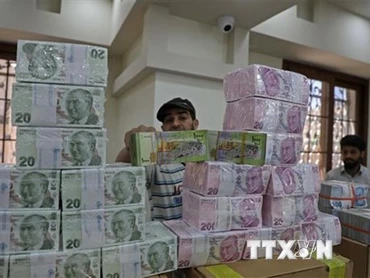 Đồng lira của Thổ Nhĩ Kỳ. (Ảnh: AFP/TTXVN)