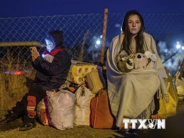 Trẻ em Ukraine ở Lviv sơ tán tới khu vực biên giới giáp miền đông Ba Lan tránh xung đột. (Nguồn: AFP/TTXVN)