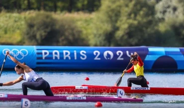 Nguyễn Thị Hương (áo vàng đỏ) không thể tạo nên bất ngờ tại Olympic Paris 2024. (Ảnh: TTXVN)